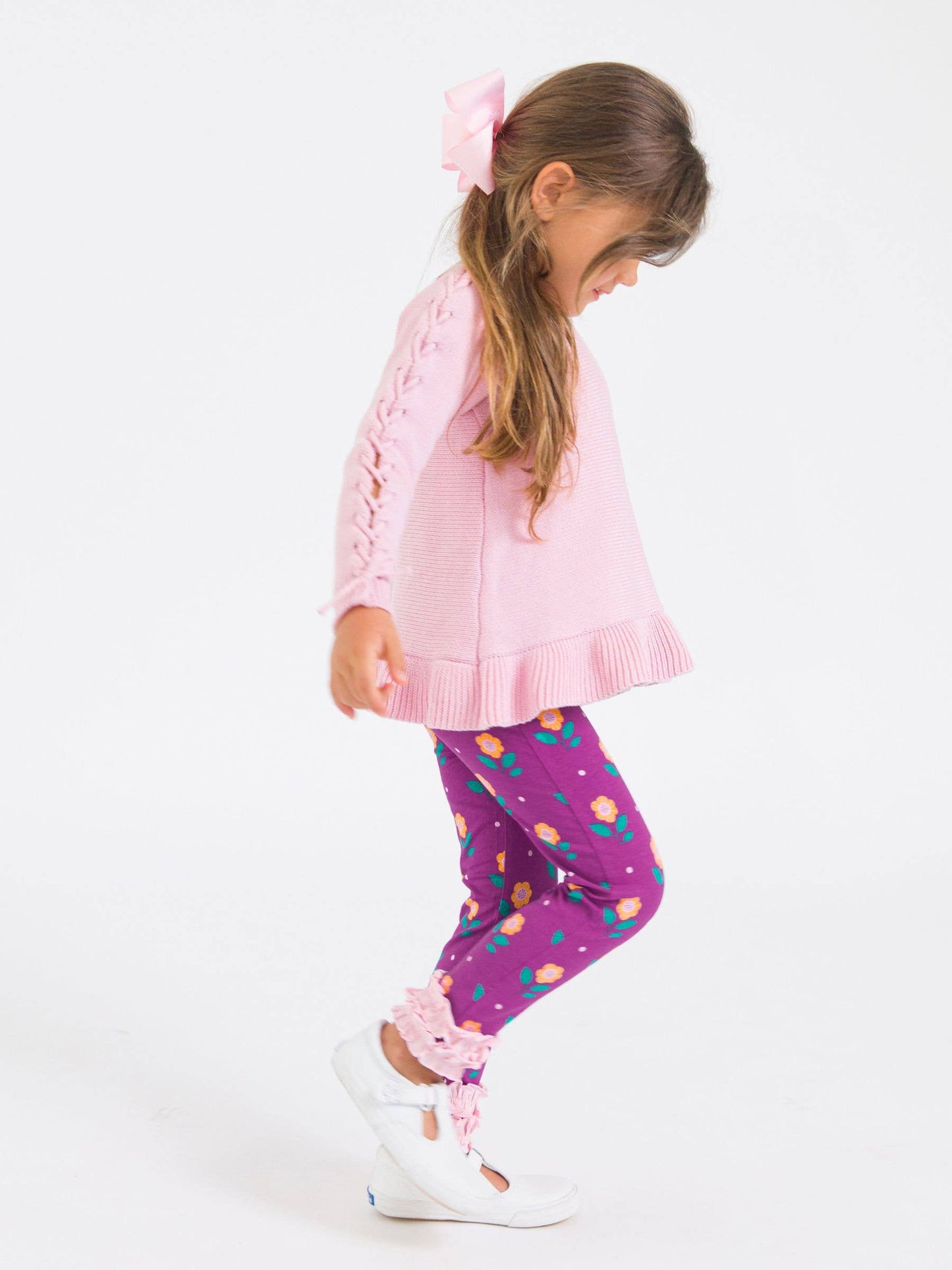 RuffleButts + RuggedButts - Girls Pink Ruffle Hem Lace Up Sweater