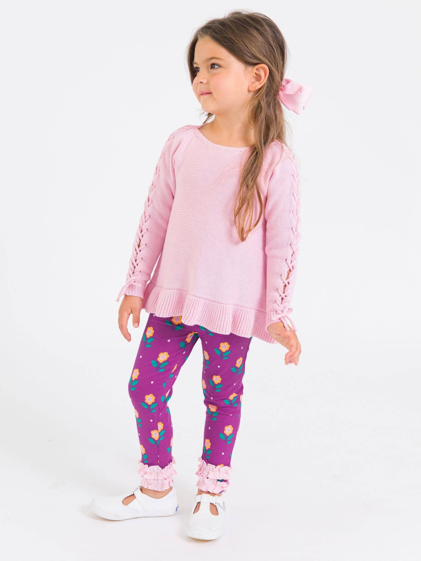 RuffleButts + RuggedButts - Girls Pink Ruffle Hem Lace Up Sweater